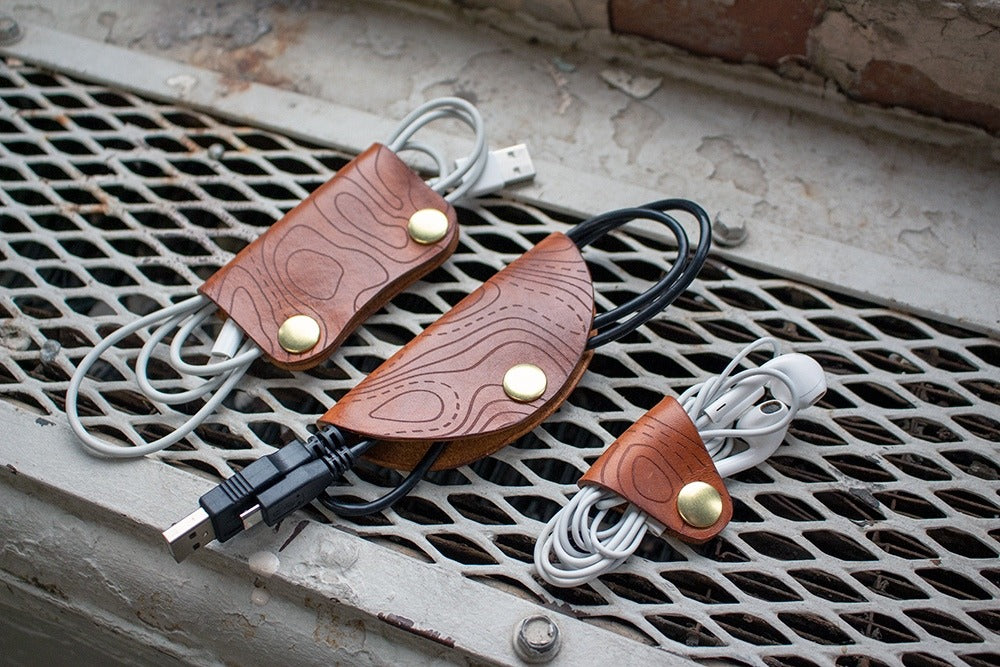 A pattern for 3 simple leather headphone holders